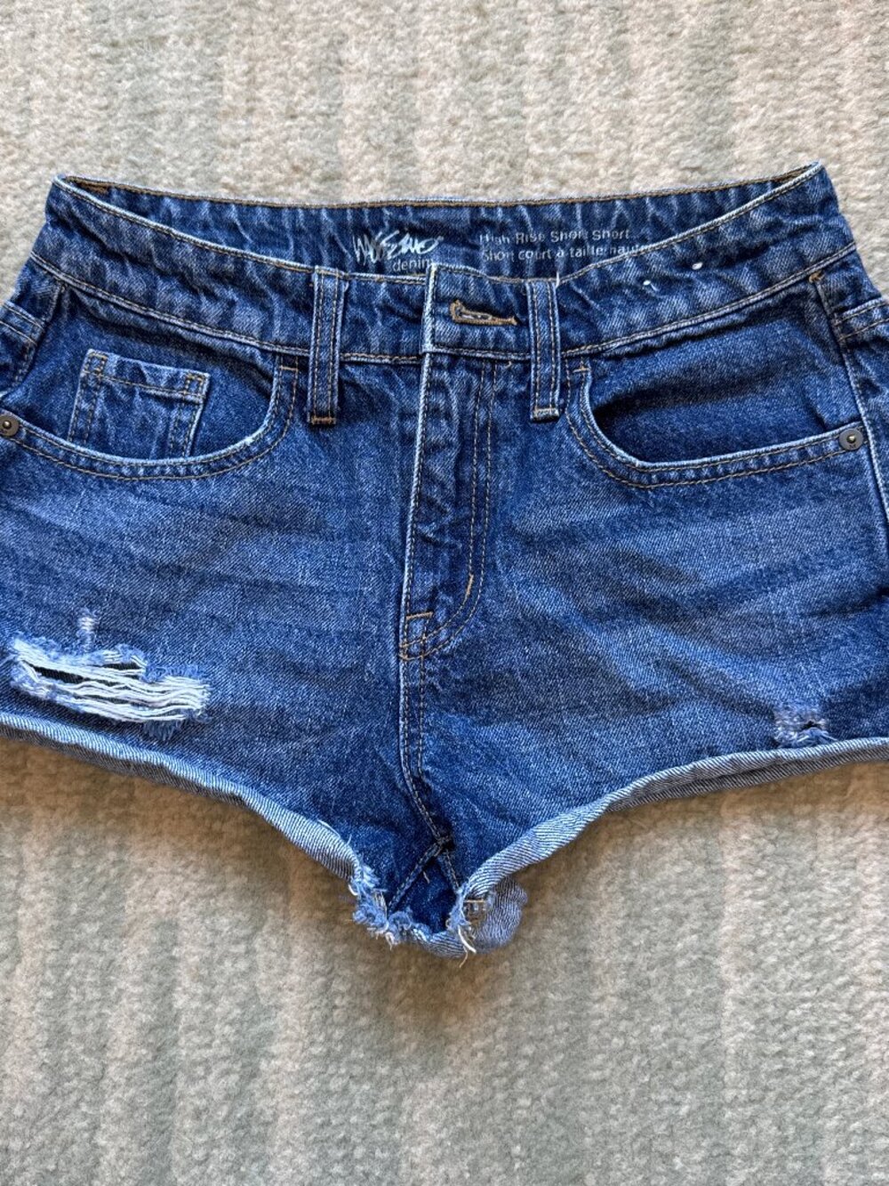 Y2K low rise denim shorts with frayed hem